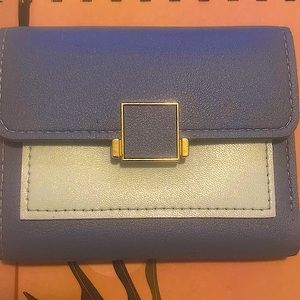 Blue wallet with gold clasp